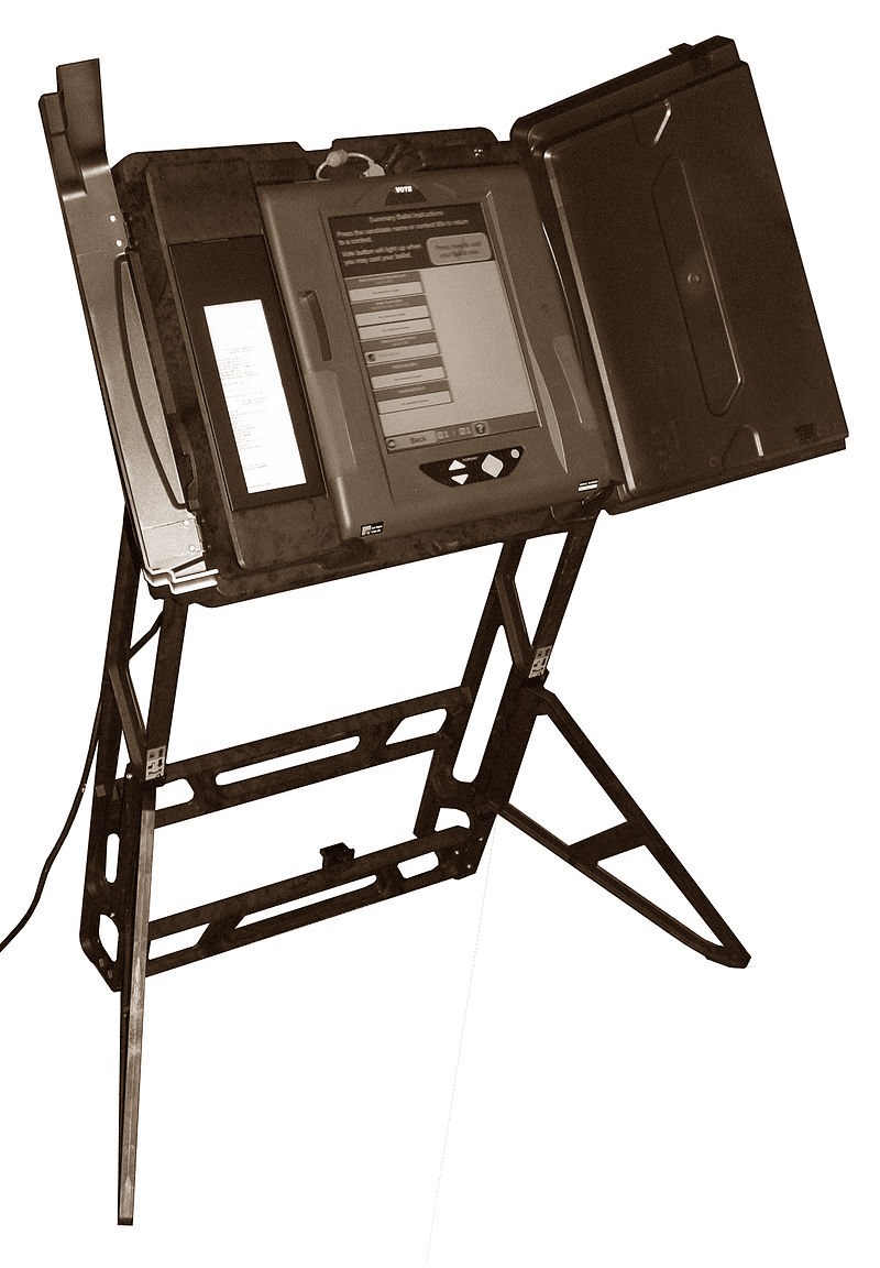 A Direct-Recording Electronic Voting (DRE) machine with Paper  for Voter to Verify